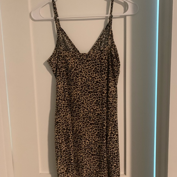Cutest cheetah print mini dress! Adorbs for a date or night out with the girls! - Picture 3 of 3